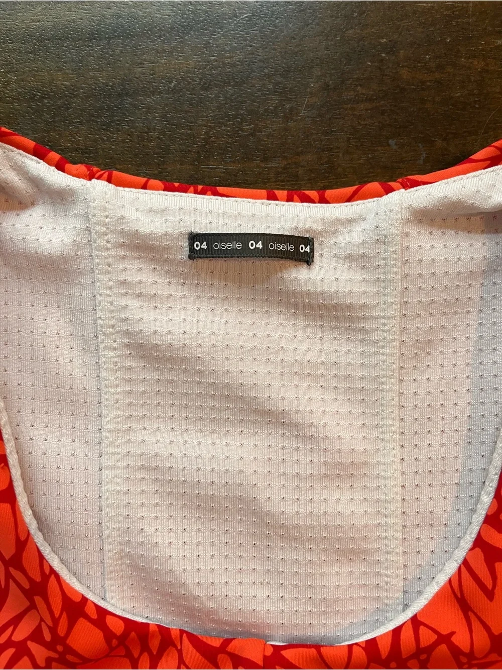 oiselle Flyout Bra Orange with Red Patterned Sports Bra